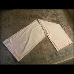 Set of two Light Pink Pottery Barn kids curtains.